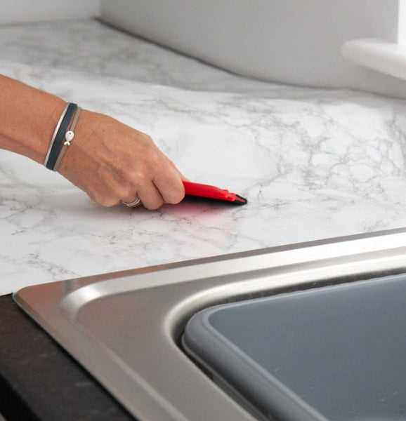 Adhesive vinyl application to benchtop