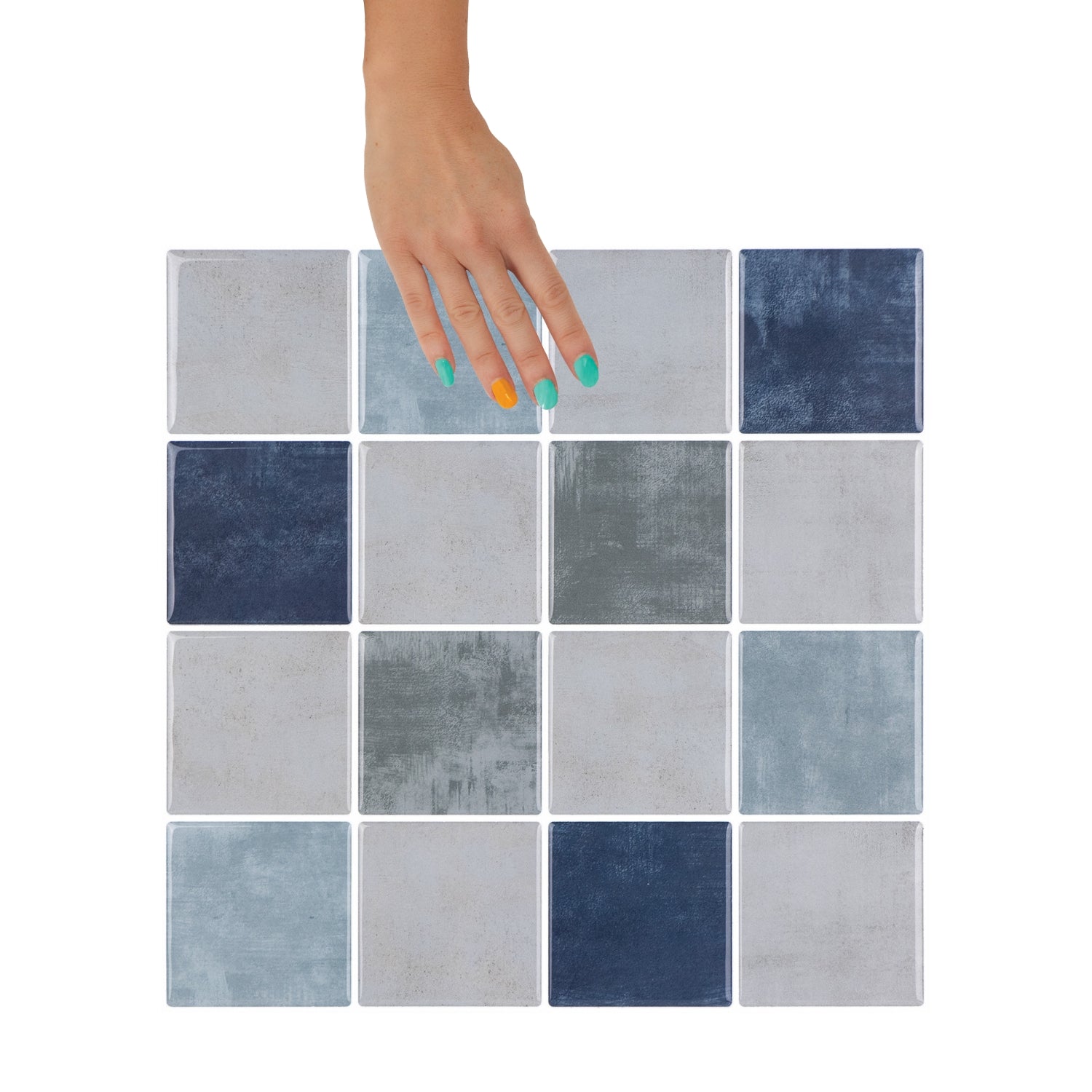 Decorative setting with a vase, croissant, and candles against a tiled checkered blue and grey wall.