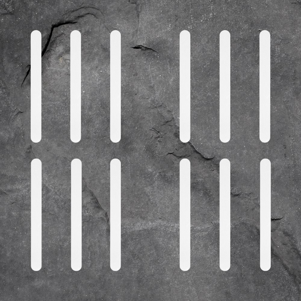 Clear anti-slip grip strips on slippery tiled bathroom floor