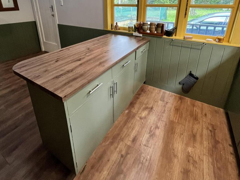 Customer photo of woodgrain adhesive vinyl on benchtop