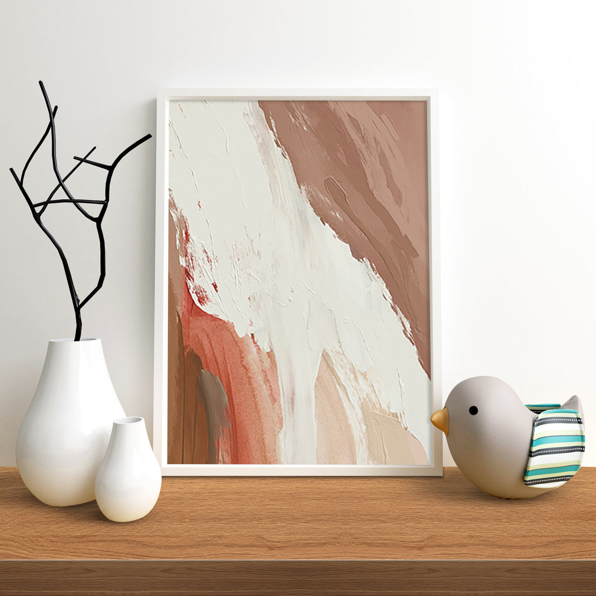 Abstract art print on a wooden shelf with decorative items
