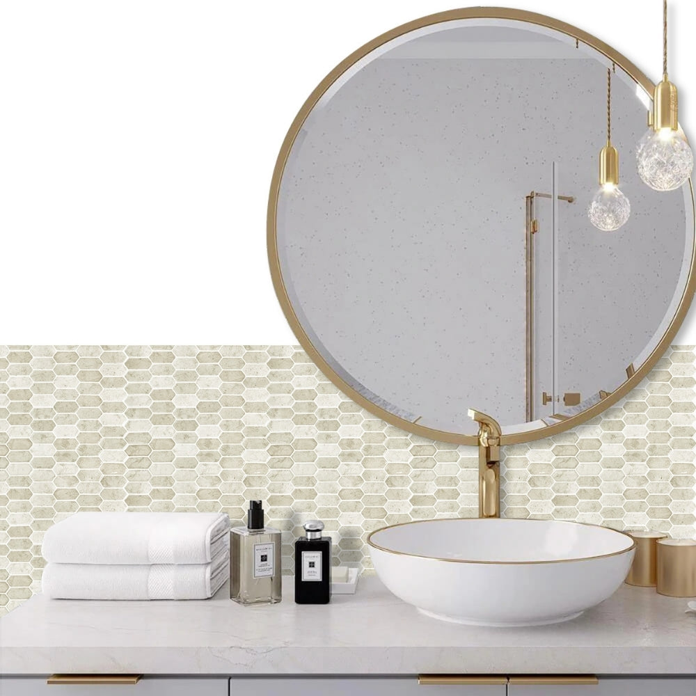 Bathroom vanity with round mirror, white sink, and decorative elements.