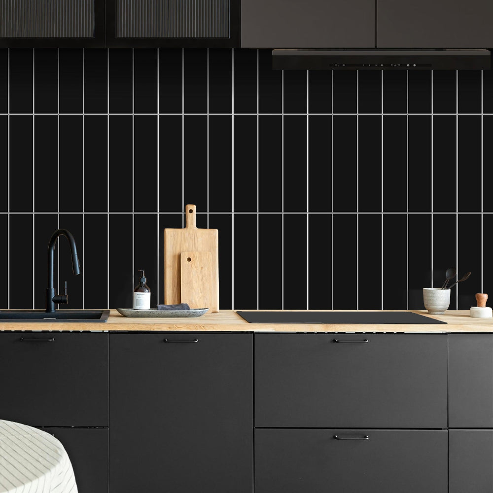 Black gloss composite wall tiles in kitchen
