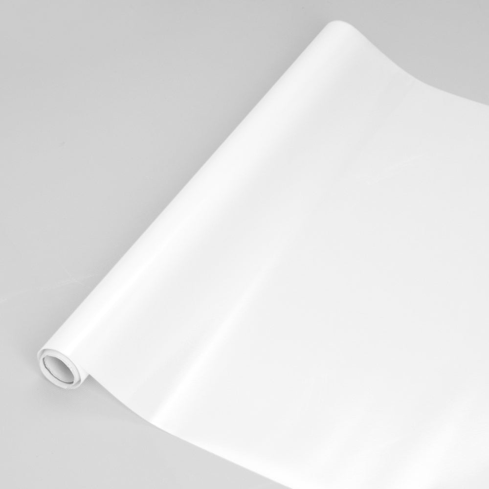 Roll of white frost window film on a white background