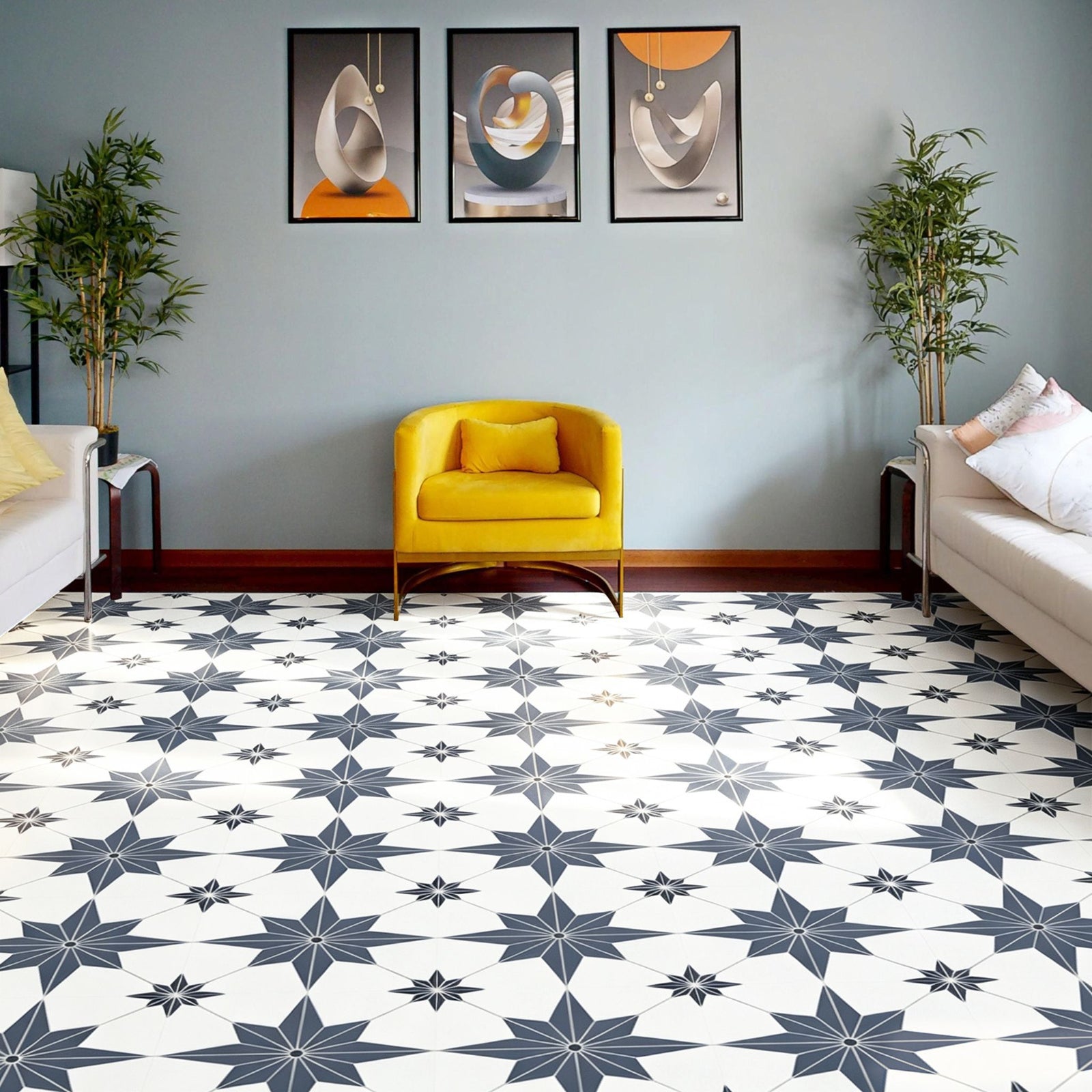 Porto Blue quick fix floor tiles in a star pattern on a lunge floor with a yellow arm chair and two white couches