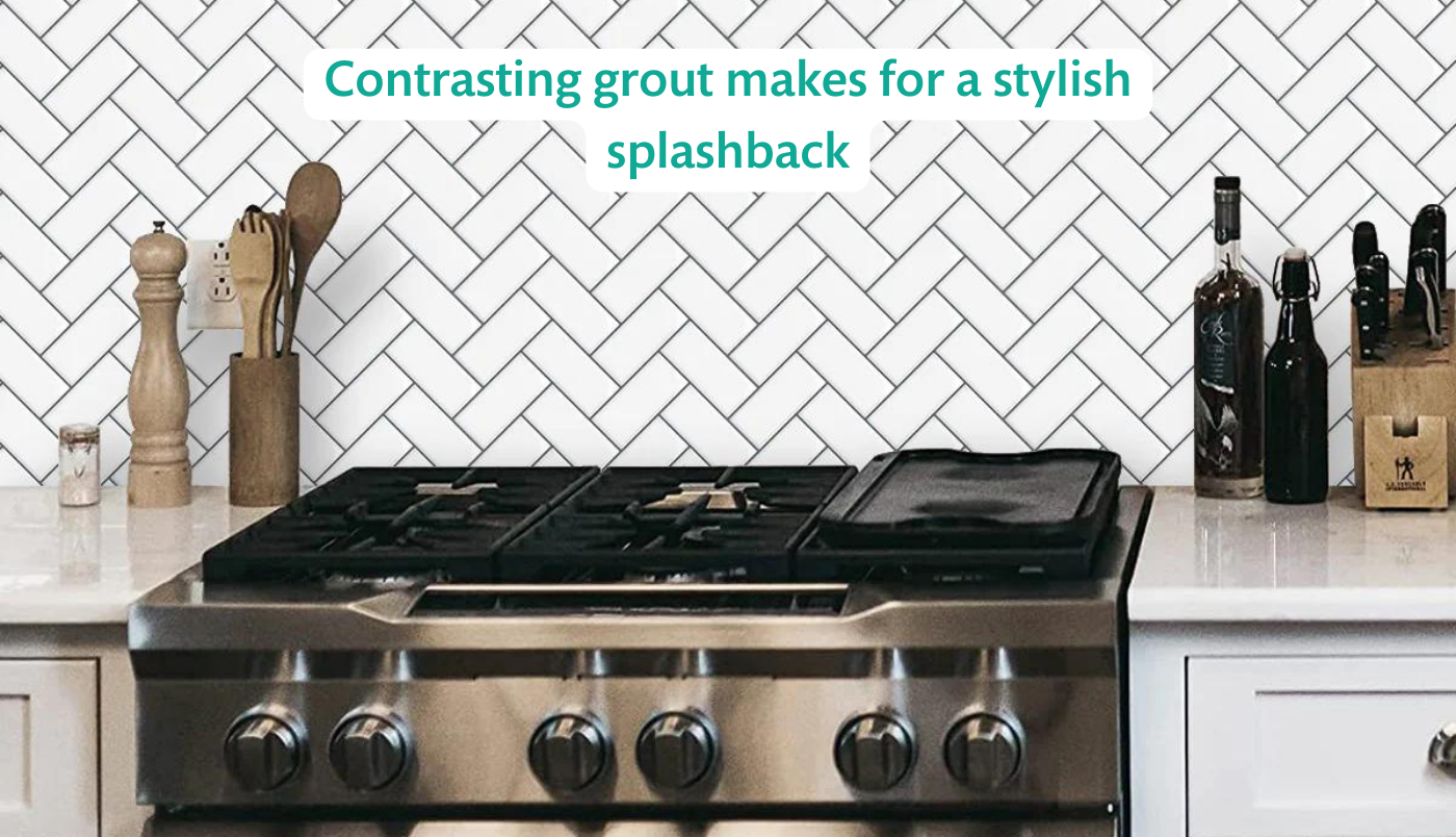 White tile and grey grout kitchen splash back with text saying: contrasting grout makes for a stylish splashback