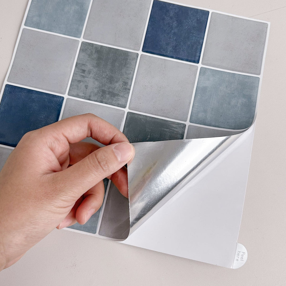 Blue, greige and green checkered tiles with white grout easy to peel