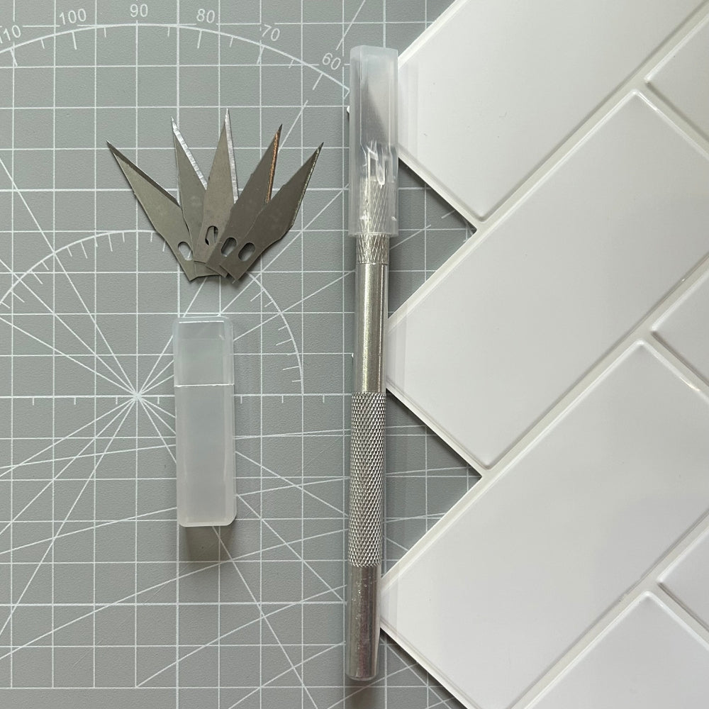 Craft knife with 5 replacement blades for cutting self-adhesive tiles