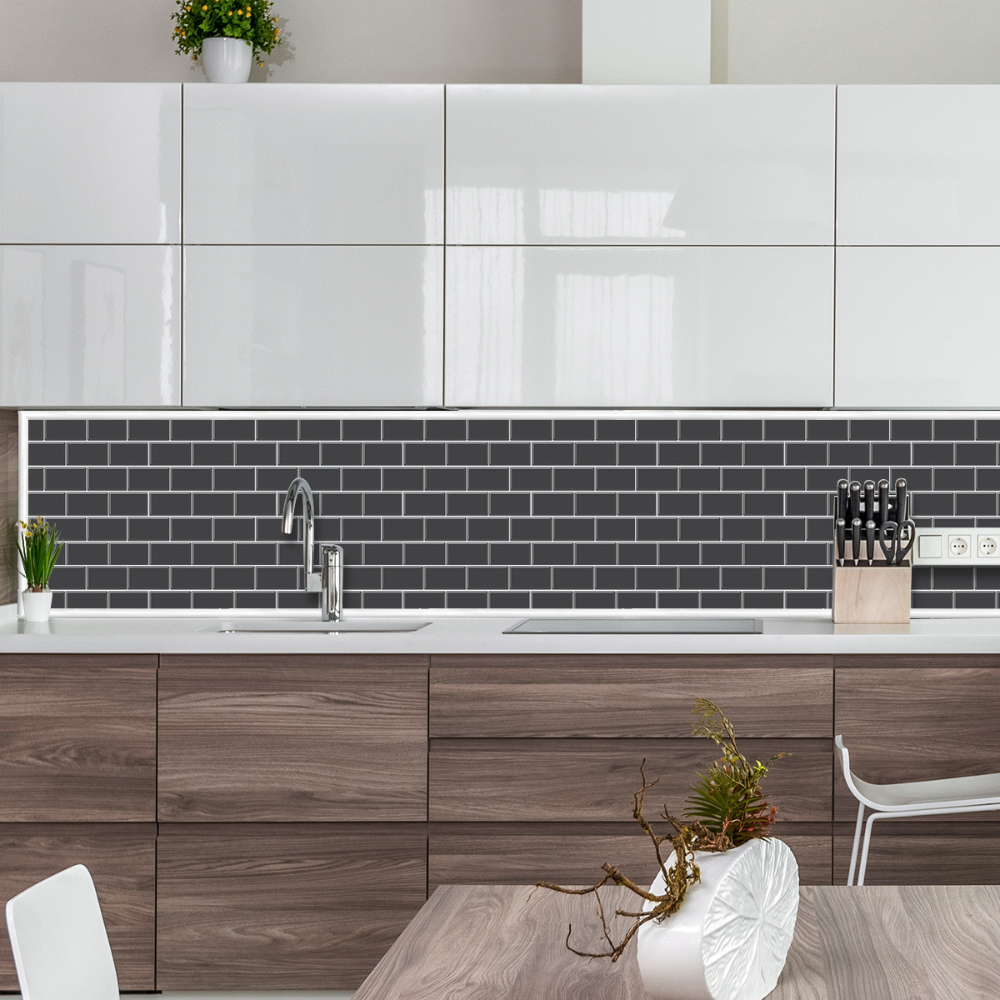 White edge trim wrapped around tiles