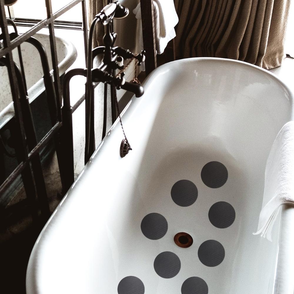 Grey anti-slip grip dots in bath