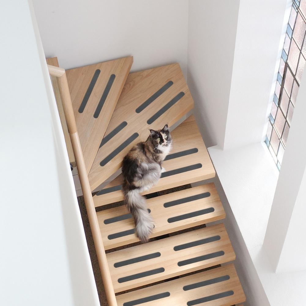 Grey anti-slip grip strips in stairs