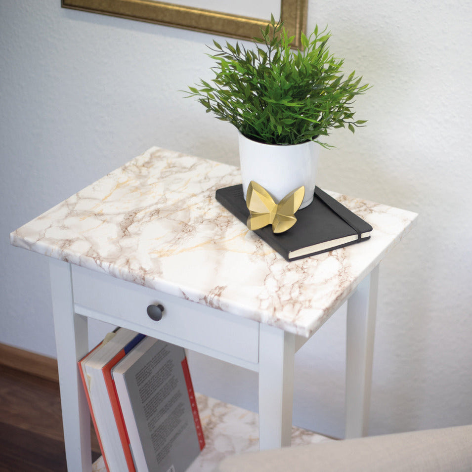 Marble cortes brown adhesive vinyl on side table