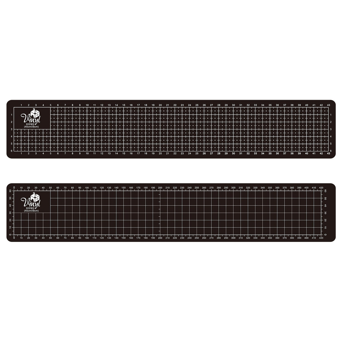 Two black cutting mats with grid lines on a white background
