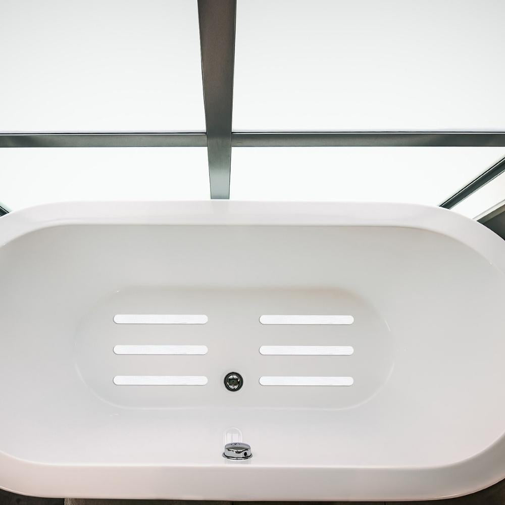 White anti-slip grip strips in bath