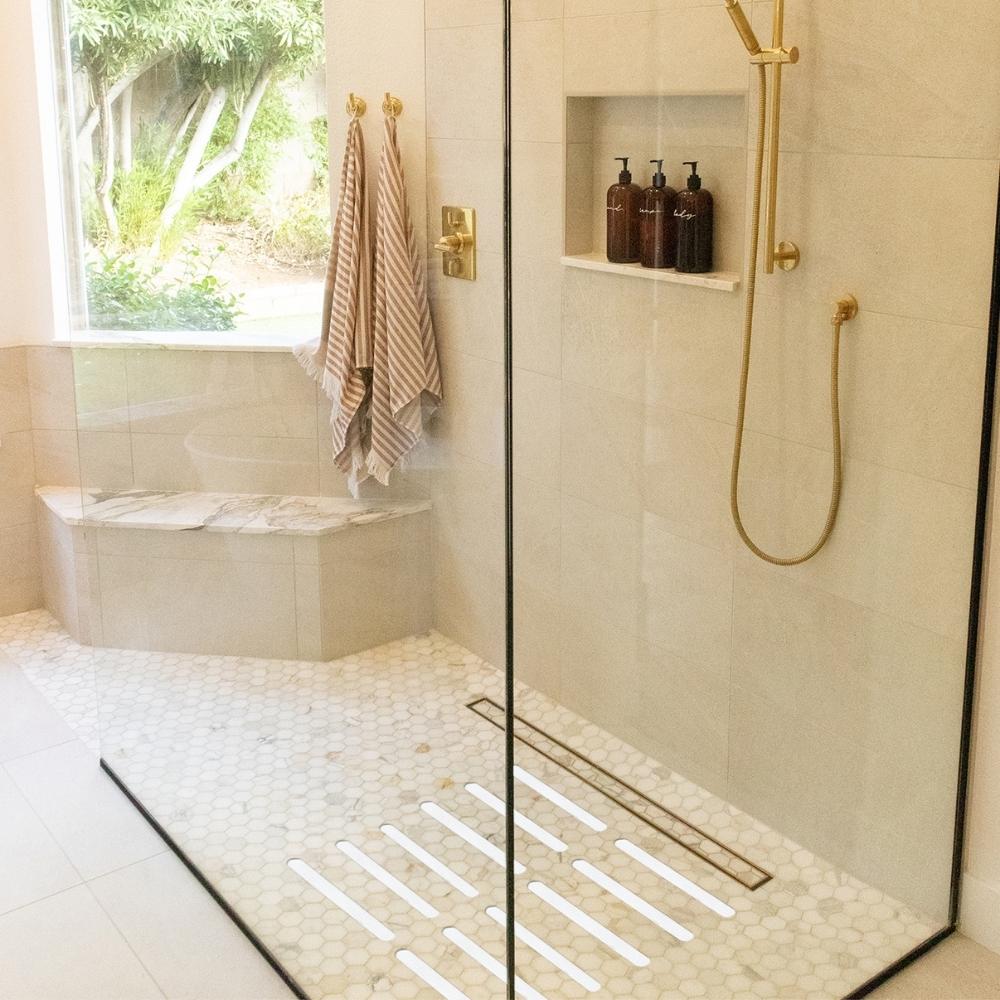 White anti-slip grip strips in shower