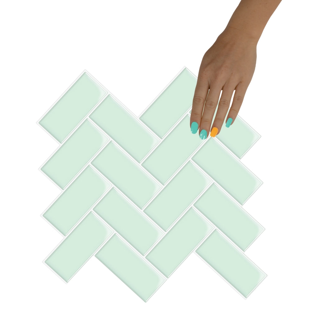 mint herringbone tiles in laundry room