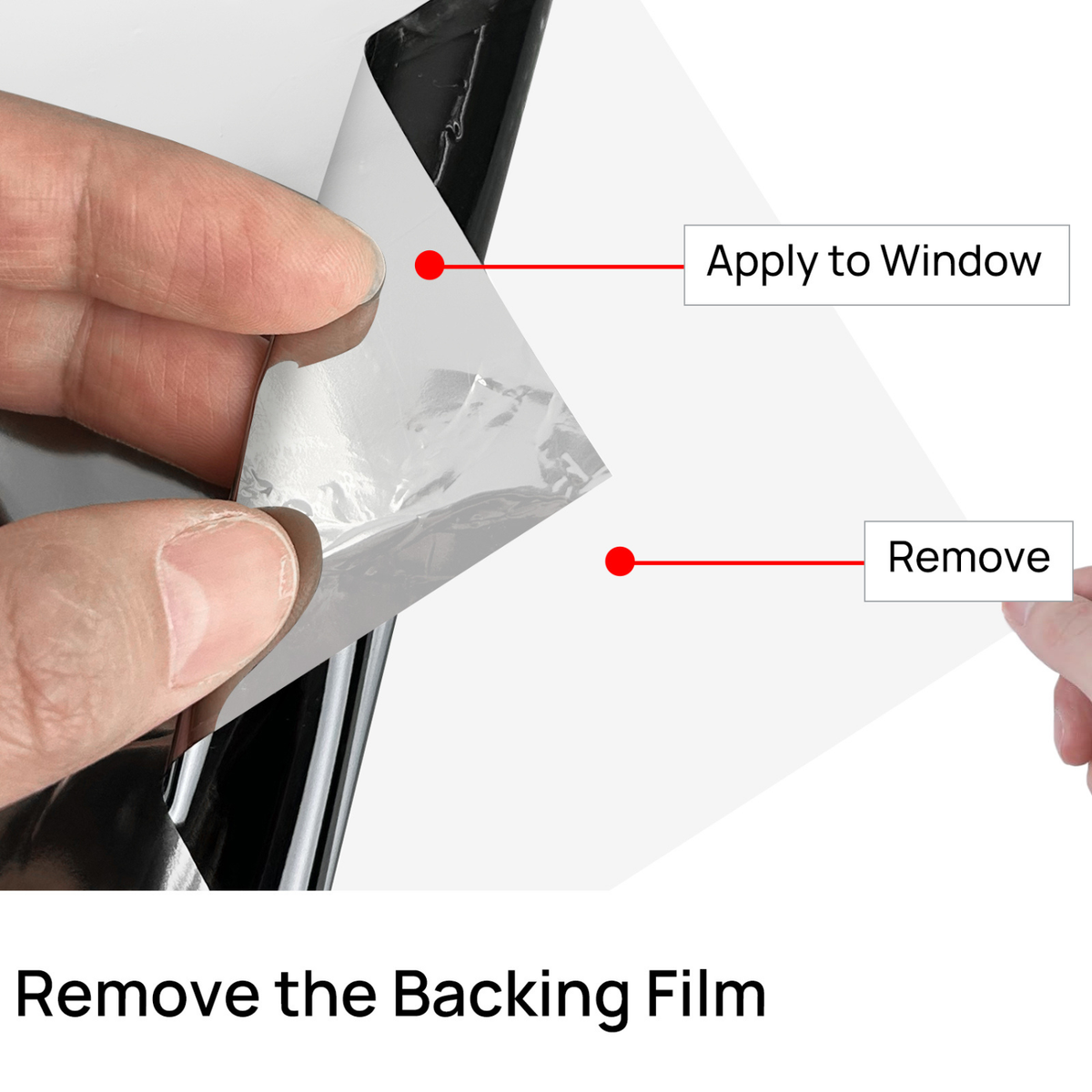 Hand applying a window film with text instructions on removal.