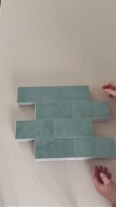 subway distressed teal gloss composite tiles being shown