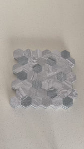 Hexagon marble grey composite tiles being shown