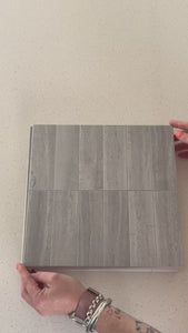 Stacked subway concrete composite tiles being shown