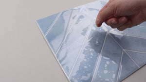 Sky blue chevron peel and stick tiles installation