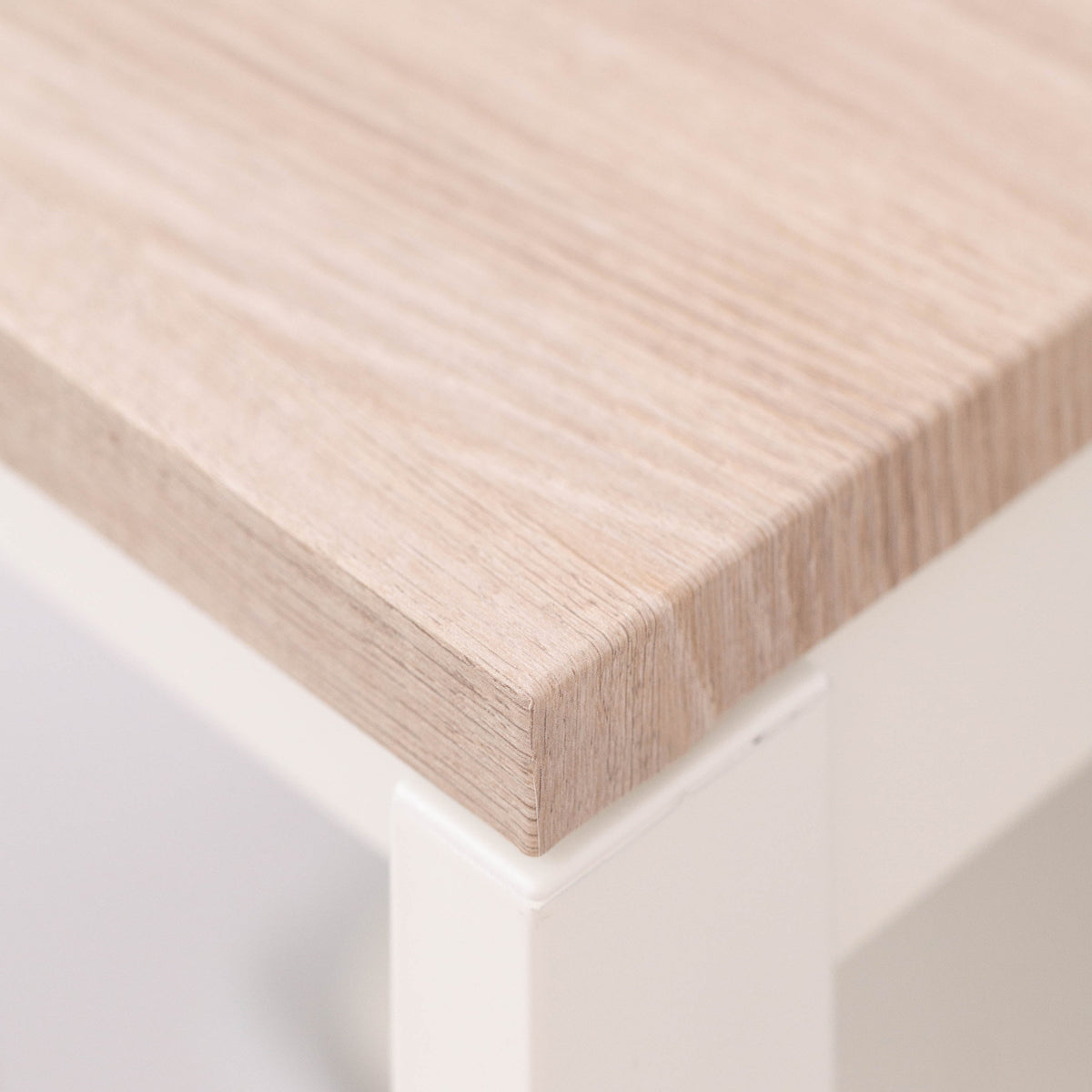 dinner table corner wrapped with santana oak vinyl